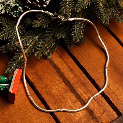 Liora Bar Necklace in pure silver showing softly curved bar links forming an organic silhouette.