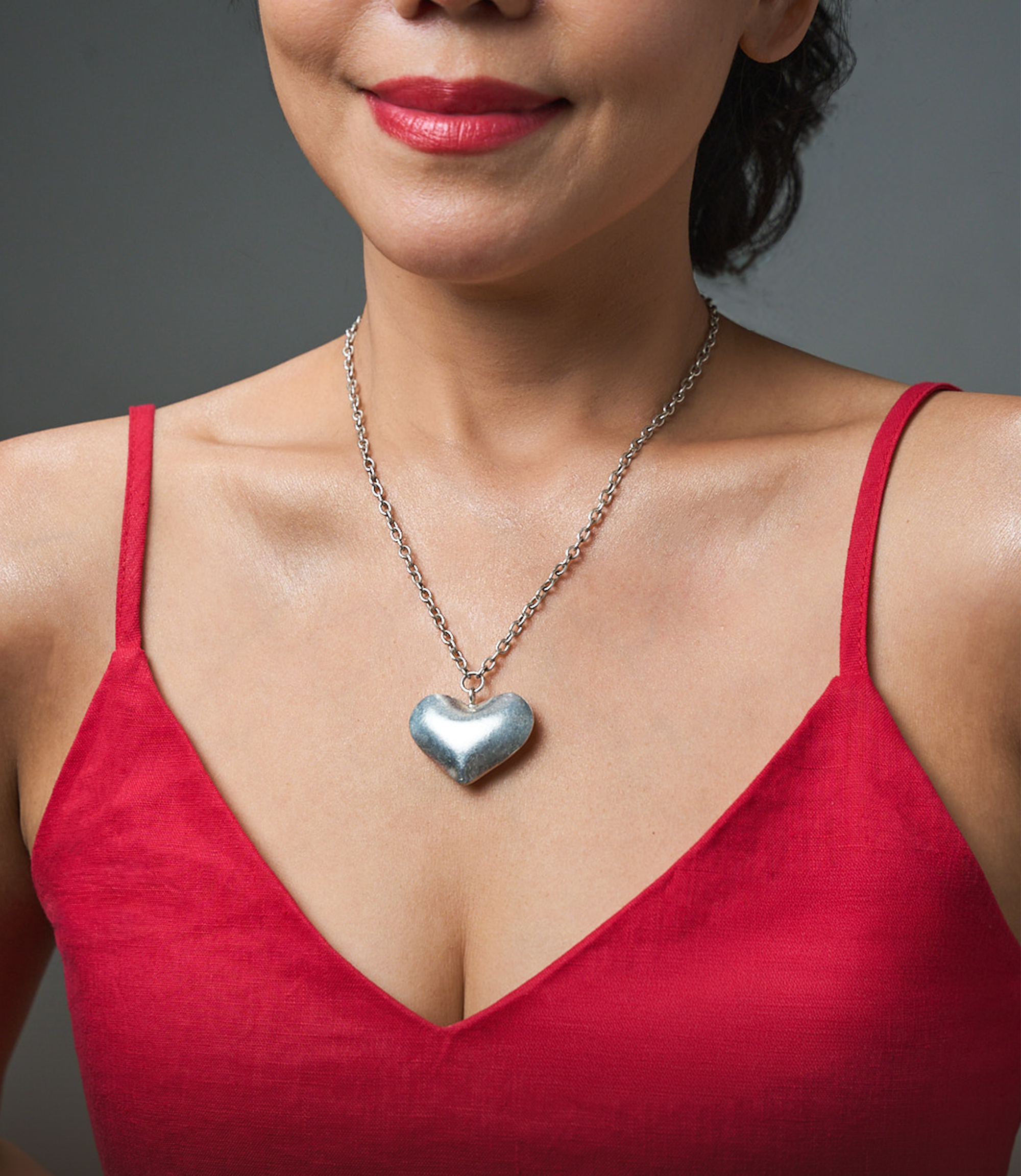 Model wearing Lauren Heart Necklace, a timeless pure silver heart necklace for everyday styling.