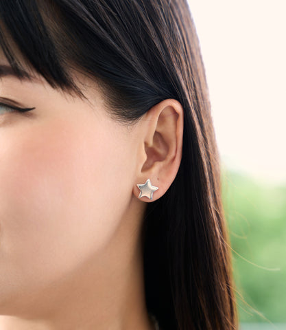 Pure silver Stella Stud Earrings worn on ear