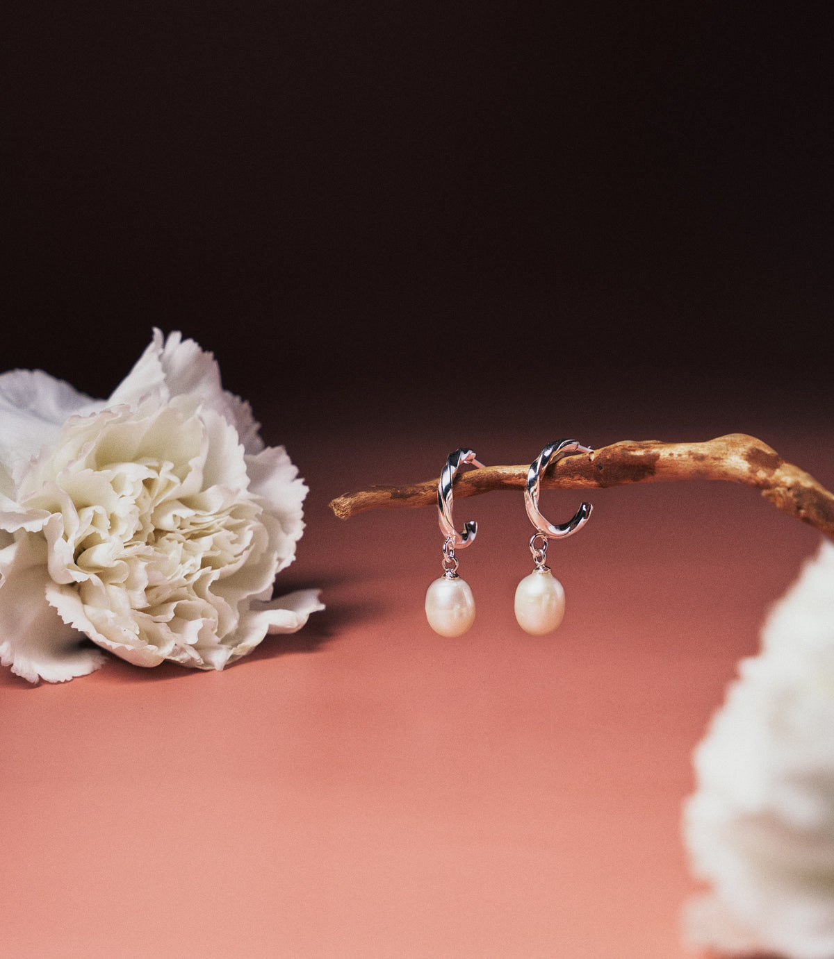 Twisted silver hoop earrings with pearl pendant, minimalist jewellery by Hill To Street