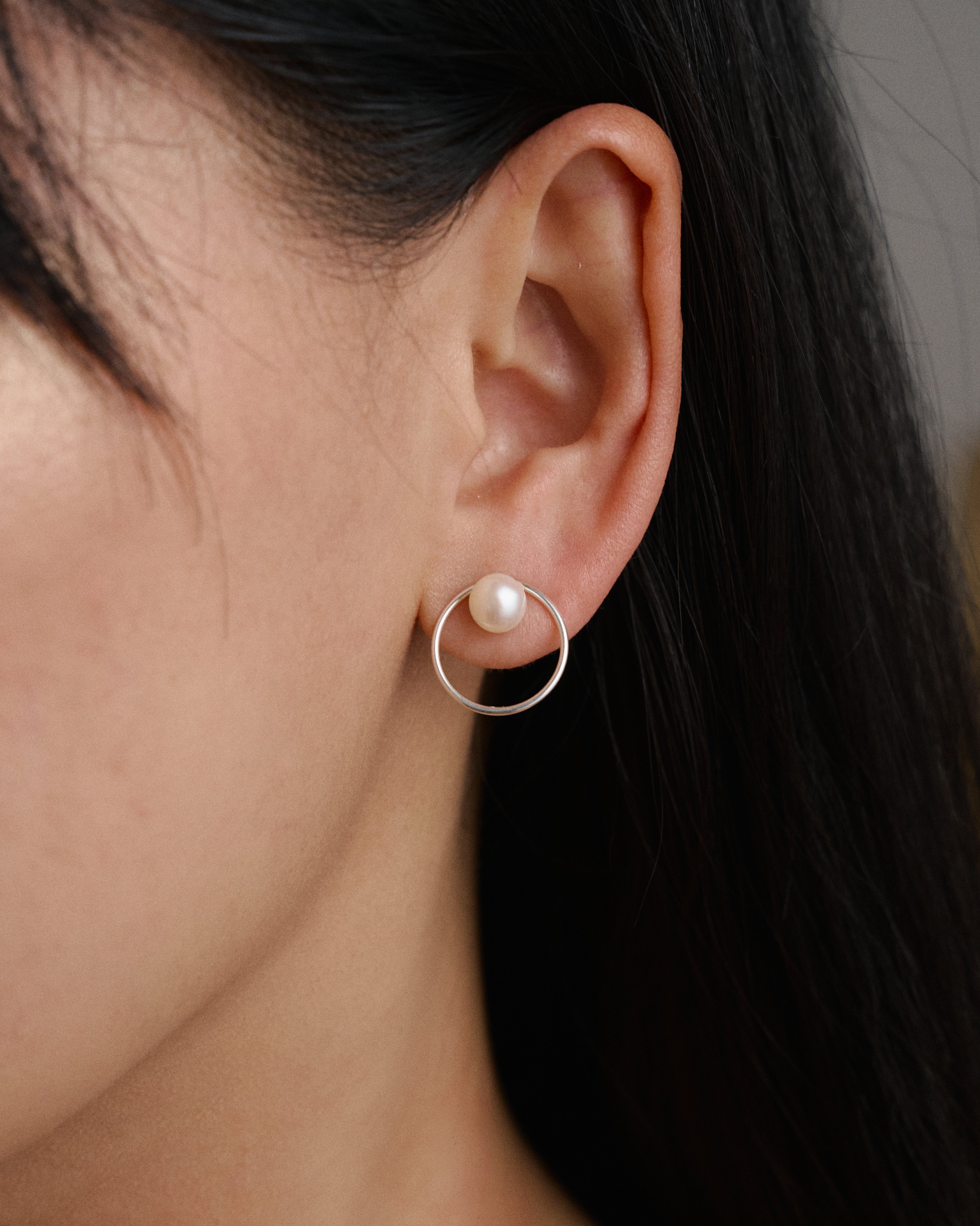 Model wearing The Elina Pearl Earrings, elegant 925 sterling silver pearl earrings for everyday styling.