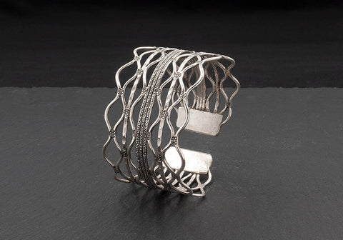 Wavy wires silver statement bangle